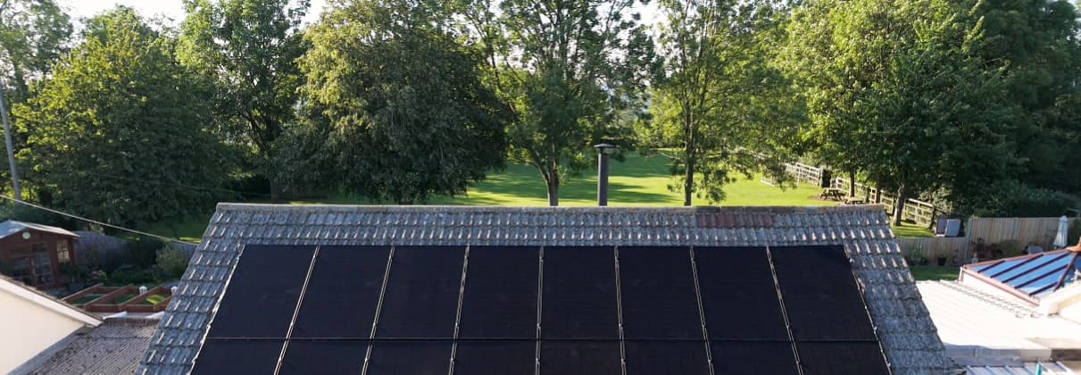 Aerial view of the panel array and surrounding garden at Pete & Sarah's home