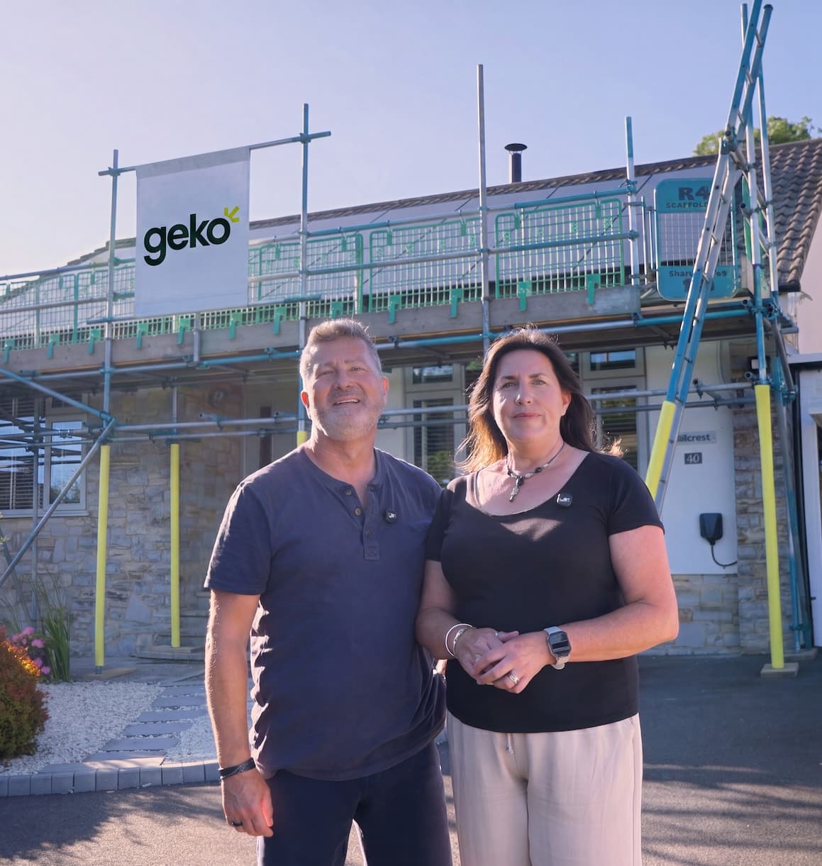 Pete & Sarah outside their finished solar install, Somerset