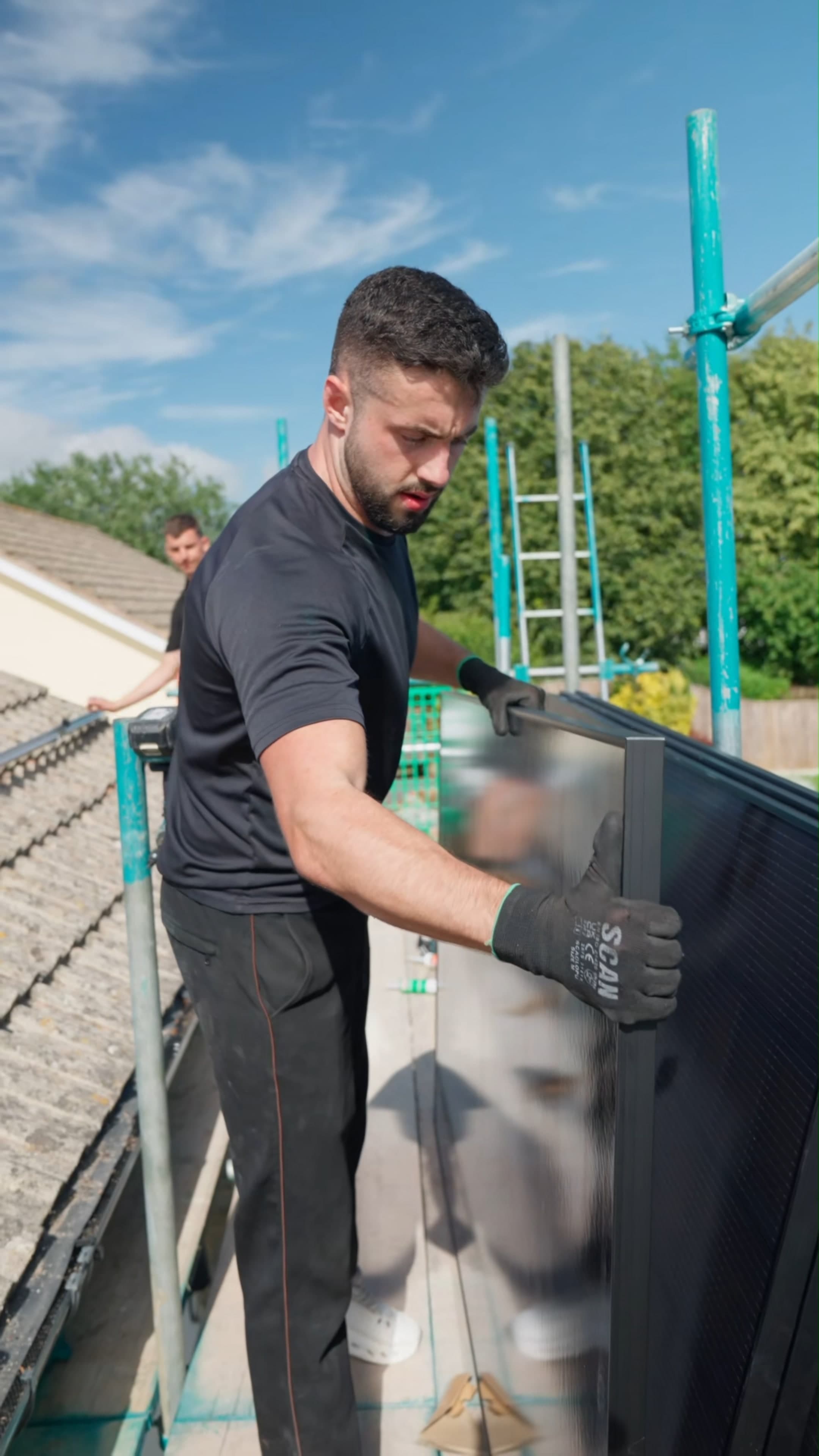 A Geko engineer fitting a panel during Pete & Sarah's Somerset install
