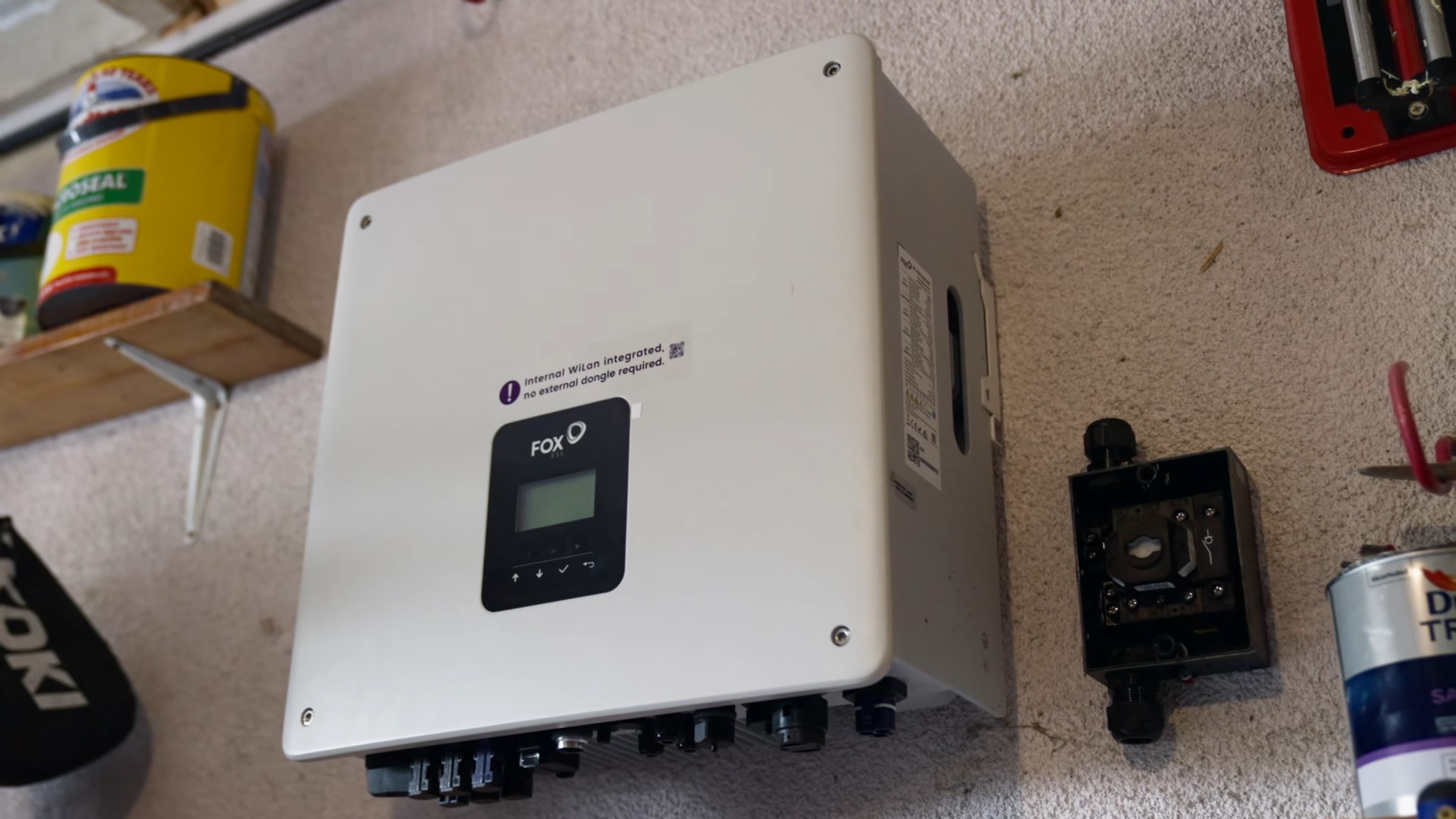 A Fox ESS hybrid inverter installed in a UK garage